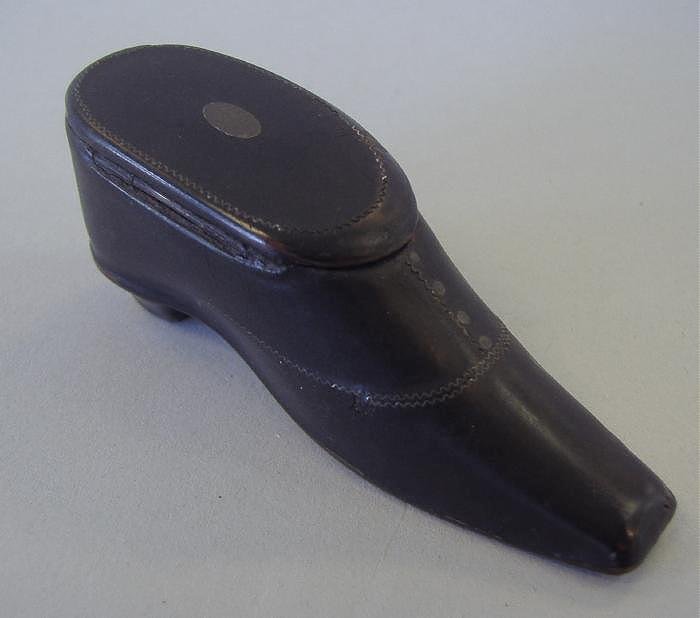 Antique Shoe Formed Papier Mache Snuff Box: Shoe formed papier mache' snuff box with hinged lid. Silver buttons and an oval silver medallion.