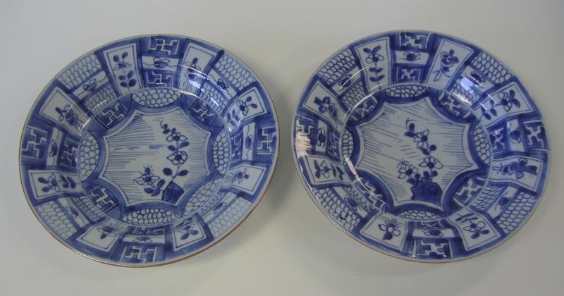 Pair of Chinese Kangxi Porcelain Plates: Pair of Chinese Kangxi (1662-1722) , blue and white porcelain plates or shallow bowls. Each measuring 8-7/8" in diameter and1.5" high.