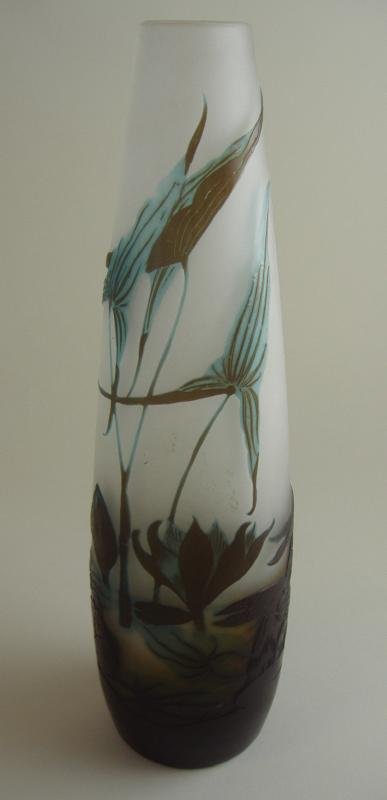 Emile Galle Cameo Glass Vase or Lamp Base: Art glass cameo glass vase with lily pad motif. Signed Galle. The vase measures 10.75" high. Factory drill hole/plugged at base.