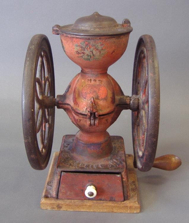 Enterprise Coffee Grinder Philadelphia, PA, 19thc: Enterprise Coffee Grinder. 19th century. Original paint and decals. Top of base reads: Enterprise Mfg, Co, Pat. Oct. 21. 73, Philadelphia, PA. Measures 11.75" high.
