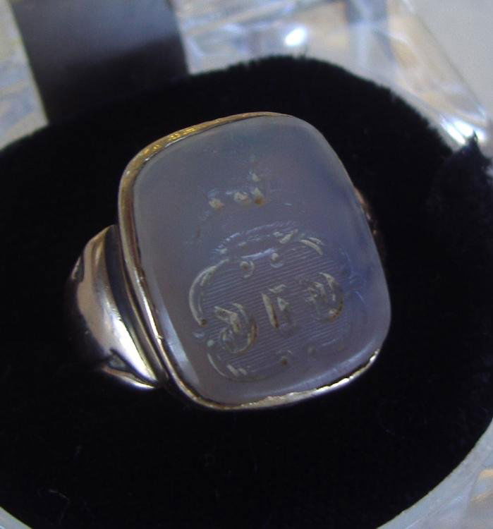 9K Gold Intaglio Signet Seal Ring: 9K gold signet seal ring. Carving of a leaping stag over 3 initials. The intaglio measures 5/8" x 1/2". Ring size 8.5. Overall weight, 5.7 grams.