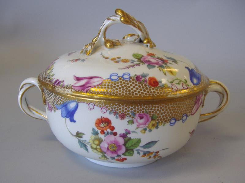 Meissen Porcelain Tureen, Hand Painted Florals: Meissen porcelain 2-handled tureen. Hand painted floral decoration. Measures 5.5" in diameter, 8" long from handle to handle and 4.75" high to top of branch-formed finial. Crossed swords mark underfoo
