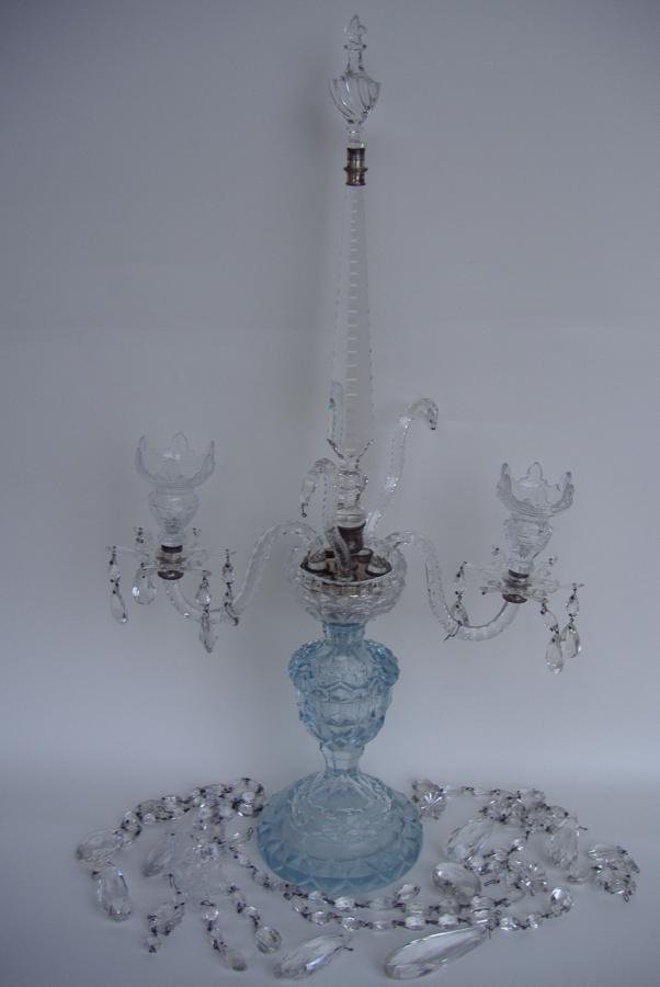 19thc Cut Crystal Blue & Clear Glass Candelabra: 19th century cut crystal candelabra. Light blue base with clear glass arms and bobeches. NOTE: in "as is" condition. One arm missing, as well as other missing parts. Many unattached crystals included.
