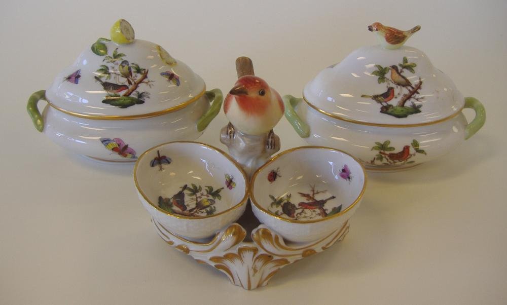 Herend Porcelain Tureens & Salt Cellar Dish: Two Herend porcelain sauce tureens. One in the Rothschild bird pattern the other in a similar pattern with lemon finial. Each measuring 5" from handle to handle and 3.75" wide. Together with a Herend 