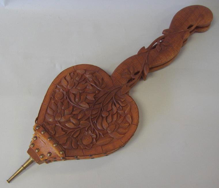 19thc Balinese Carved Wood Fireplace Bellows: Well carved. Measures 26" long.