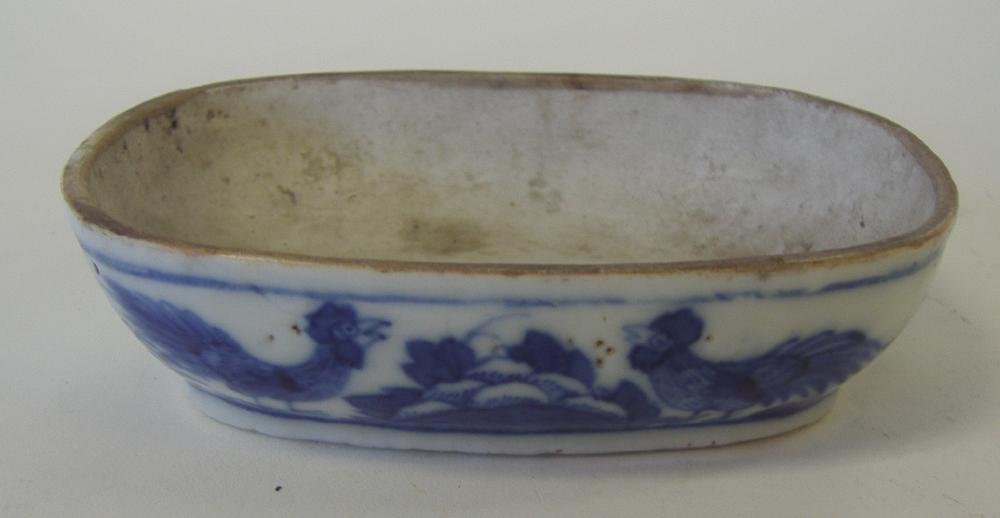 19thc Chinese Porcelain Bird Feeder. Rooster Motif: Chinese blue and white porcelain bird feeder. 19th century. Rooster motif. Unique form, measures 4" x 3.25" x 1-1/8" high. Estate of RMS.
