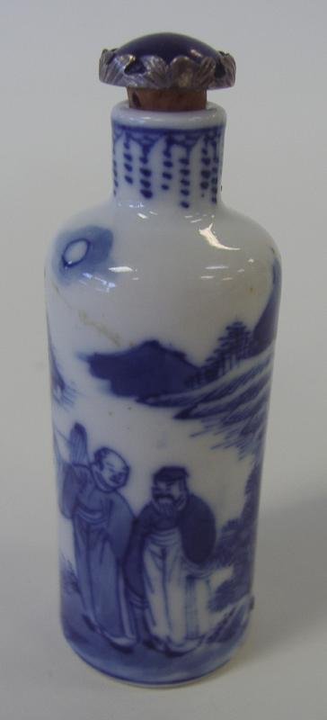 19thc Chinese Blue & White Porcelain Snuff Bottle: Chinese blue and white porcelain snuff bottle. 19th century. Lapis lazuli stopper. Measures 3" high. Provenance: Estate of Robert McKay Shields.