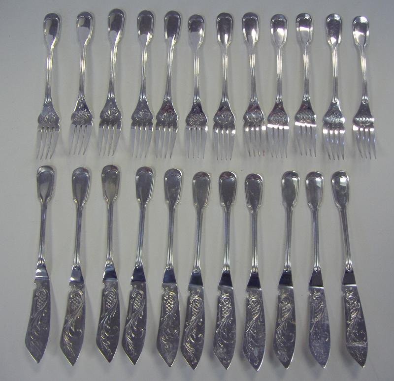 Christofle French Silverplate Fish Set for 12: French silverplate fish set for 12 (missing 1 knife). By Christofle. Etched swag motif on each of the 23 pieces.
