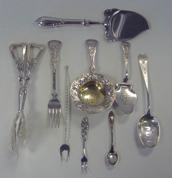 Norwegian Silver Serving Pieces Magnus Aase +: 9 Norwegian silver serving pieces. Mainly 830 silver. Magnus Aase and Marius Hammer. Includes silver handled salad tongs and cheese slice. Tea strainer, pickle fork, bon bon server, spoons, etc. Overa