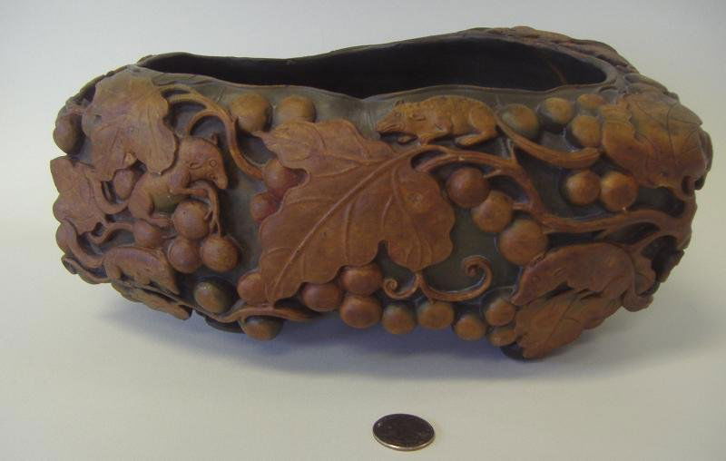 Large Chinese Carved Stone Bowl, Squirrels, Bat +: Very large Chinese carved stone bowl. Late 19th/early 20th century. Highly carved with squirrels among grapes and leaves. The underside carvings include a bat, insect and grapes. Measures 12" long, 7"