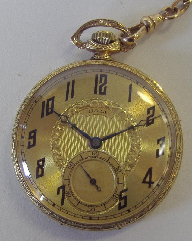 BALL 14K Gold Filled Railroad Pocket Watch & Chain: 14K gold-filled railroad pocket watch. By the Ball Watch Co, Cleveland, Ohio. 19 jewels adjusted. The face measures 1.5" in diameter. Currently running, although no guarantee of working order. The cha