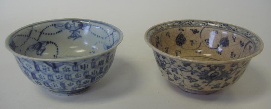18thc Asian Annamese Bowls, Crackle Glaze: Two Asian Annamese bowls, c.1750. Comprised of a blue and white porcelain bowl with a floral decorated interior and a geometric motif on the exterior. Measures 5-7/8" in diameter and 2-7/8" high. Toge