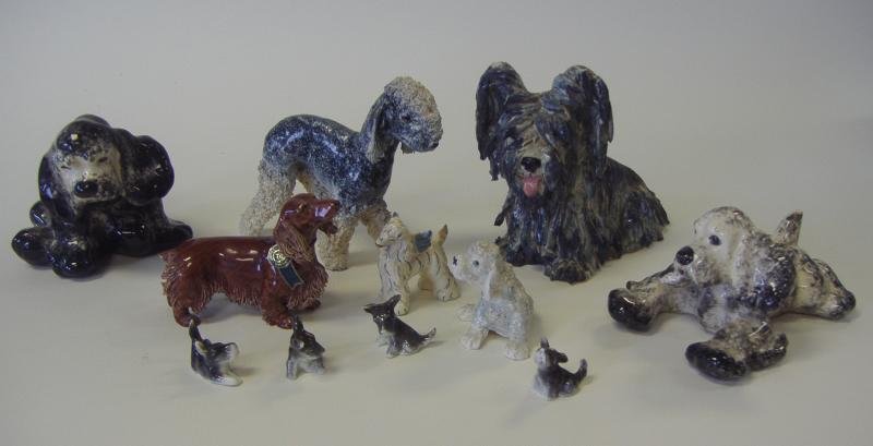 Jane Callender & Kay Finch California Ceramic Dogs: California ceramic pottery dogs. 11 dogs of various breeds by Jane Callender and Kay Finch. The largest dog measuring 5" high and 7.5" long, to the smallest measuring 1.25" high. NOTE: the largest dog