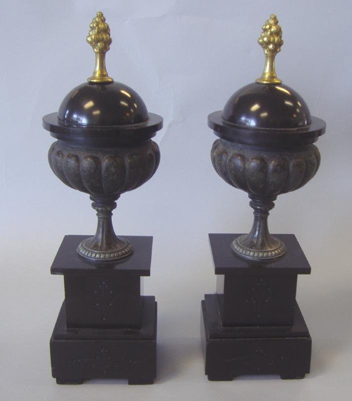 19thc Black Slate Urn Formed Garnitures: Each measuring 12.5" high.