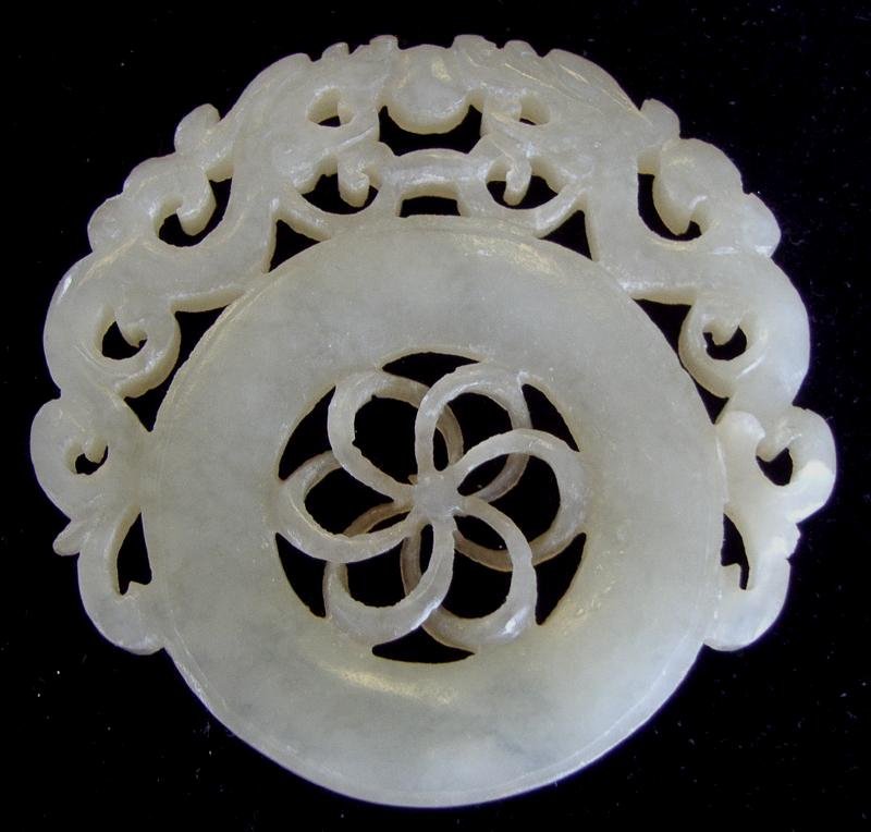Chinese Carved Hardstone Double Dragon Pendant: Well carved double dragon pendant. Early 20th century. Measures 2.25" high and 2.25" wide.