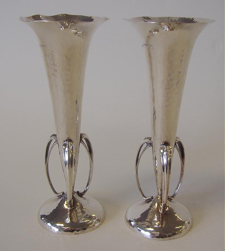 English Sterling ARTS AND CRAFTS Bud Vases: English sterling silver bud vases. English Arts & Crafts design with hand hammering. Hallmarks for London, 1906, Daniel & Arter. Each measuring 8" high. Overall weight, 12.84 troy oz.