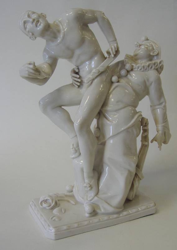 UNTERWEISSBACH Porcelain PIERROT & HARLEQUIN: Unterweissbach porcelain figural group depicting Pierrot and Harlequin; rivals for the love of Columbine. Pierrot is usually depicted as that of the sad clown, pining for the love of Columbine, who us