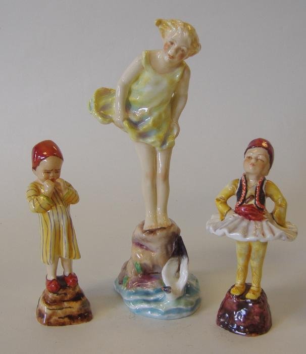 ROYAL WORCESTER F. G. Doughty Figures, Seabreeze +: Royal Worcester figurines, each modeled by F.G. Doughty. Comprised of a young girl on a rock at water's edge, titled Seabreeze, measuring 8.75" tall. Together with Egypt and Greece figures, measuring 