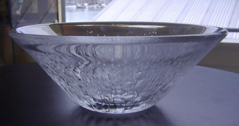 ORREFORS Modernist Bowl: Chipped ice effect. Measures 9.25" x 8.5" and 3-5/8" high. Signed and numbered F.345713.