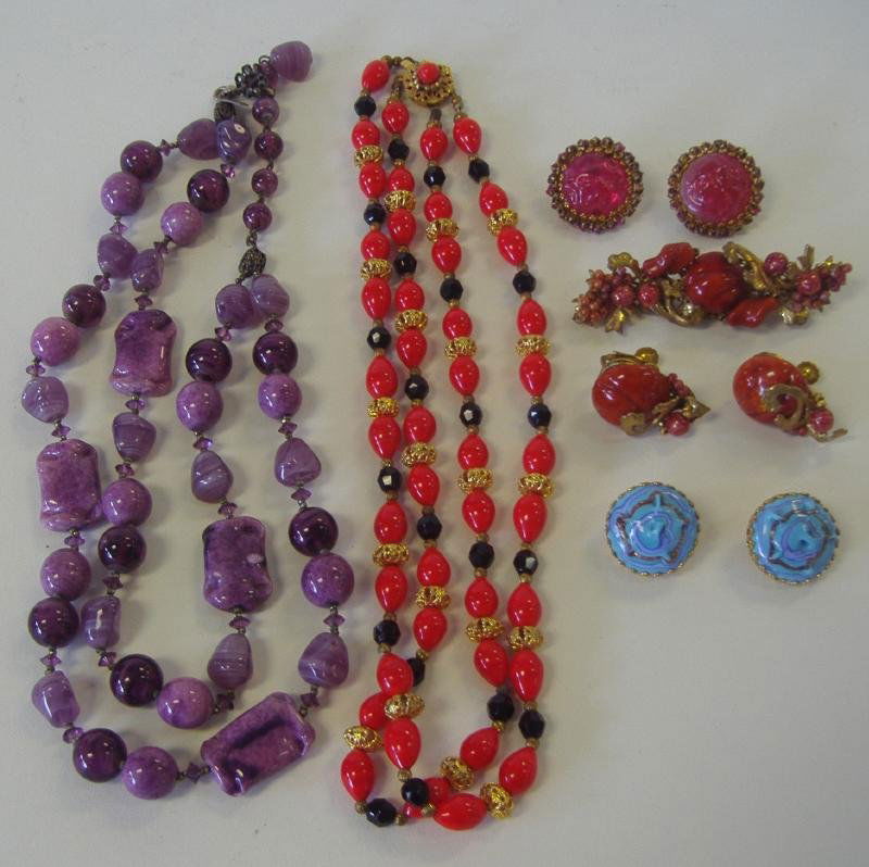 MIRIAM HASKELL Necklaces, Brooch Pin & Earrings: Miriam Haskell jewelry. Comprised of two beaded necklaces, a brooch pin measuring 2.75" long and 3 pair of earrings (2 clip on and 1 screw-back).
