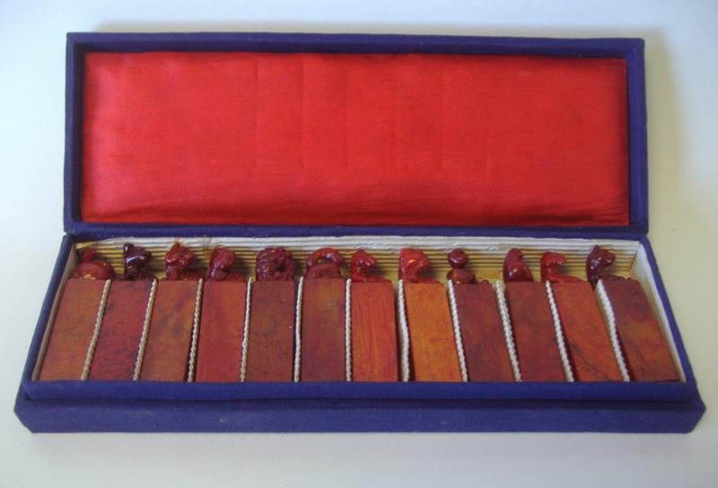 12 Chinese Soapstone Figural Animal Seal Chops: Set of 12 Chinese soapstone seal chops with animal figures. Each measuring 2-7/8" high. In blue presentation case.