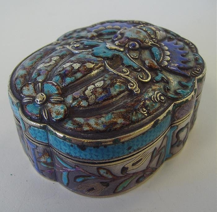 Chinese Silver & Enamel Box, Signed: Chinese silver and enamel box. The lid depicting a mythological beast. The box with a floral motif. Measures 2.5" x 2" x 1-1/8" high. Signed on the underside. Ex collection of General Joseph Warren St