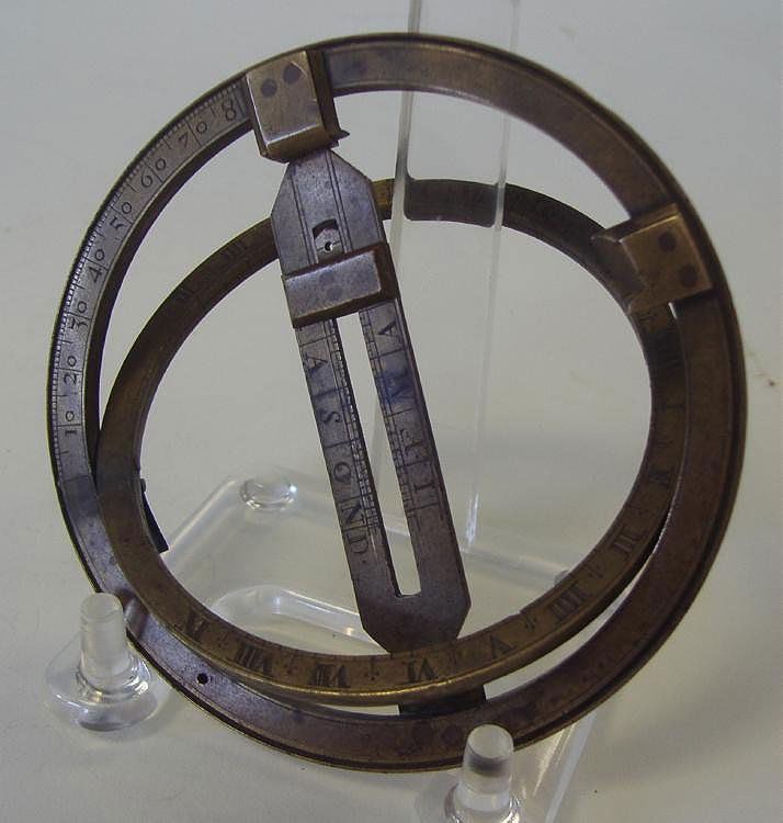 Brass UNIVERSAL EQUINOCTIAL RING DIAL: Brass Universal Equinoctial Ring Dial. Late 18th/early 19th century. Hour ring engraved with Roman numerals. Unsigned. Measures 3-3/8" in diameter.