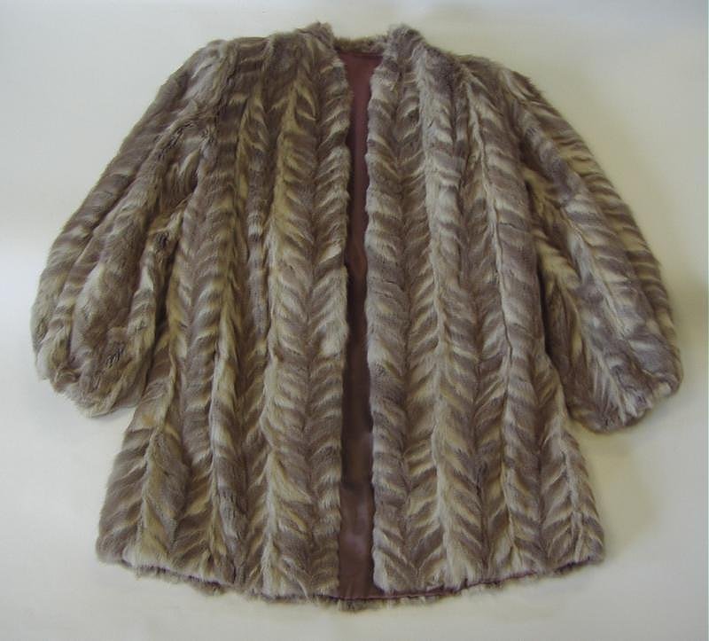 1940's Grey Squirrel Fur Coat: 3/4 length grey squirrel fur coat. Measures 19" from should seam to shoulder seam and 37" in length.
