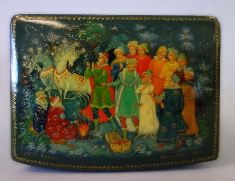 Russian Hand-Painted Lacquer Box, Palekh School: Russian hand-painted lacquer "Treasure Chest" box. Palekh school. Titled 12 Months by Kritova. Measures 2.5" x 1.75" x 1.5" high. Artist signed and dated 1985.