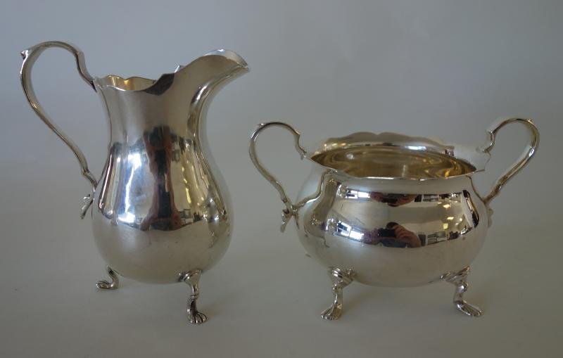 Sterling Pitcher & Sugar Bowl, Exemplar by Watson: Sterling silver cream pitcher and sugar bowl by Watson in the Exemplar pattern. The pitcher measures 4" high, the sugar bowl 3" high. Overall weight 9.02 troy oz.
