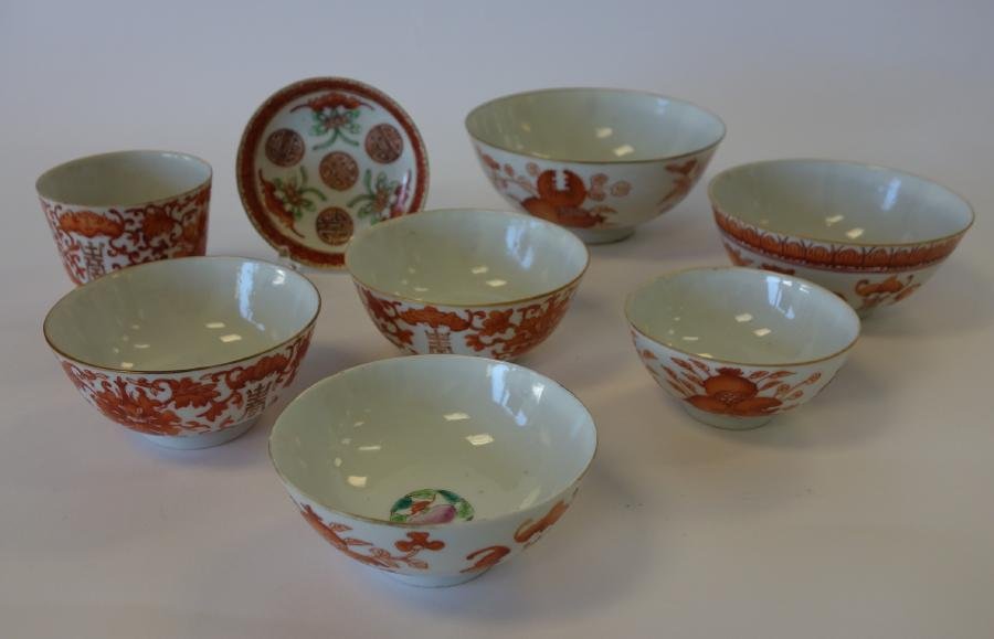 Chinese Porcelain Bowls, Bats & Florals, Signed: Chinese porcelain bowls and a small dish. Comprised of seven bowls and one small dish. Each with rouge de fer enamels depicting bats, fruits and florals. Some pieces signed underfoot. The largest bowl