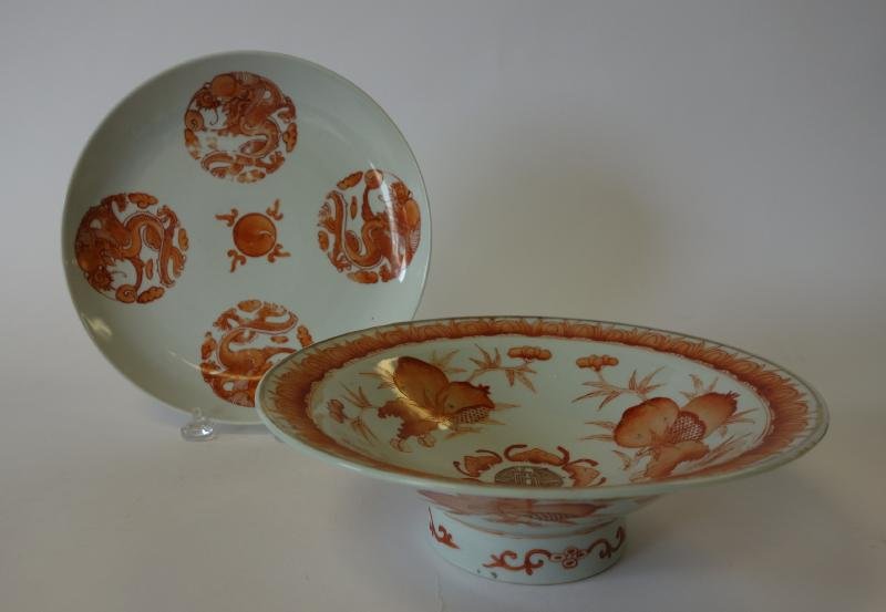 Chinese Porcelain Bowl & Plate, Bats & Dragons: Chinese porcelain footed bowl and plate. The bowl with rouge de fer enamels depicting bats, fruits and florals measures 9.75" x 3" high. The plate with a dragon motif is signed underfoot and measures 
