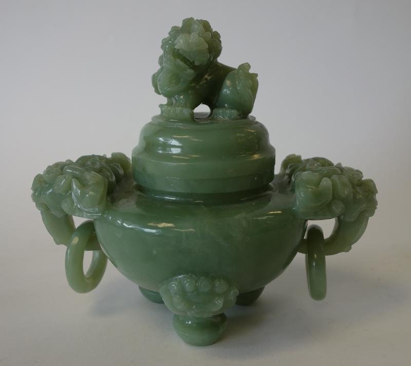 Chinese Carved Jade Censer: Chinese carved jade censer. Foo dog final on lid. The sides with foo lion / dog face handles. Measures 7" high, 8.5" wide and 5.25" deep.