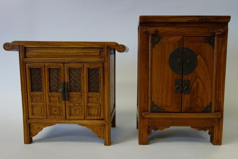 2 Chinese Table Top Altar Cabinets: Two Chinese hardwood table top altar cabinets. The tallest with interior drawer measures 13" high, 8.5" wide and 6" deep. The second cabinet with stepped interior measures 10.5" high, 12" wide and 6-5