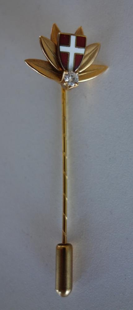Diamond & 14K Gold White Cross Stick Pin: 14K gold stick pin, set with a diamond beneath a red enamel shield with a white enameled cross. Vienna, Austria. Measures 2.25" long. Weighs 3.5 grams. Comes with original presentation case.