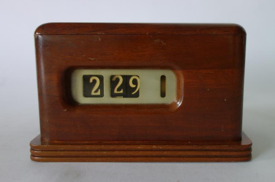 Barr Digital Desk Clock, Walnut Case: An electric (self-starter) desk clock by Barr, Weedsport, NY. c.1940s. Digital display. Walnut case measuring 6.75" x 4" x 4" high. Currently in well running order.