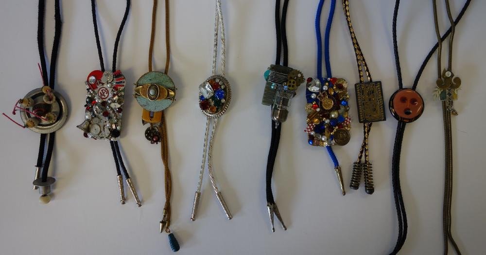 9 Modern Designer Lariat Bolo Ties: Nine modern designer bolo ties. 2 signed April (by April Winchell the current voice of Clarabelle Cow and the daughter of ventriloquist Paul Winchell), 1 signed DeGroot and 1 signed Jim Kodeka. The ot