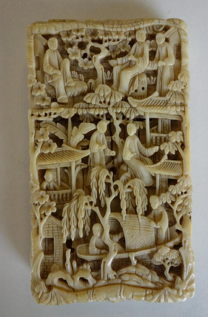 19thc Chinese Carved Ivory Card Case: A Chinese ivory calling card case. Finely and deeply carved with great intricacy on all sides depicting scenes from mandarin life. Measures 3-5/8" x 2-1/8" x 9/16" thick. NOTE: It is the buyer's respo