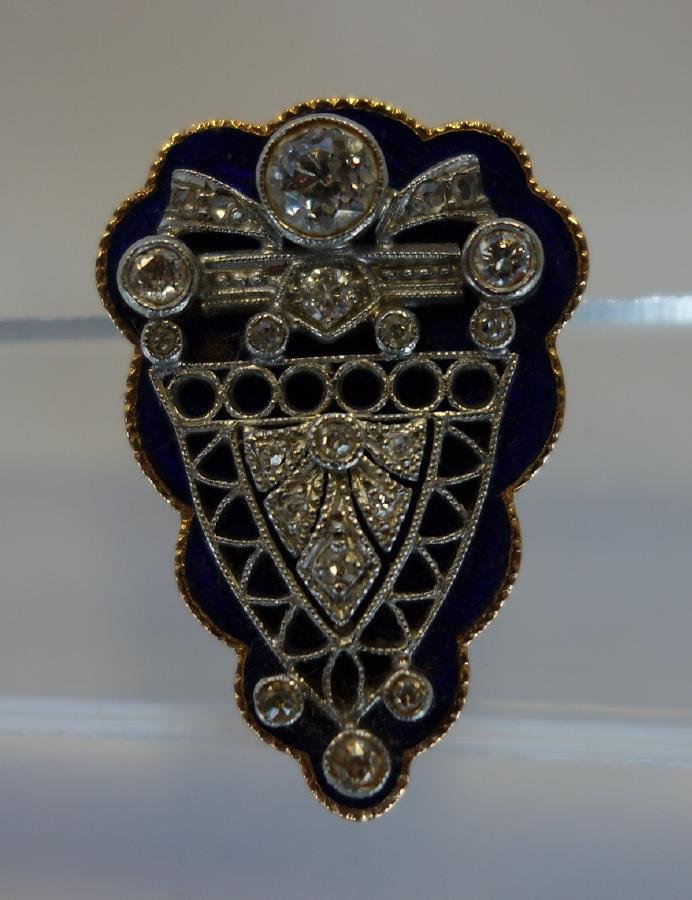 Diamond, Enamel & 14K Gold Earring, c.1900: A single earring, c.1900. European and Princess cut diamonds set against a blue enamel ground and mounted in 14K white and yellow gold. The clip back is stamped 14K. Pat Pend. Measures 1" x .75". Weig