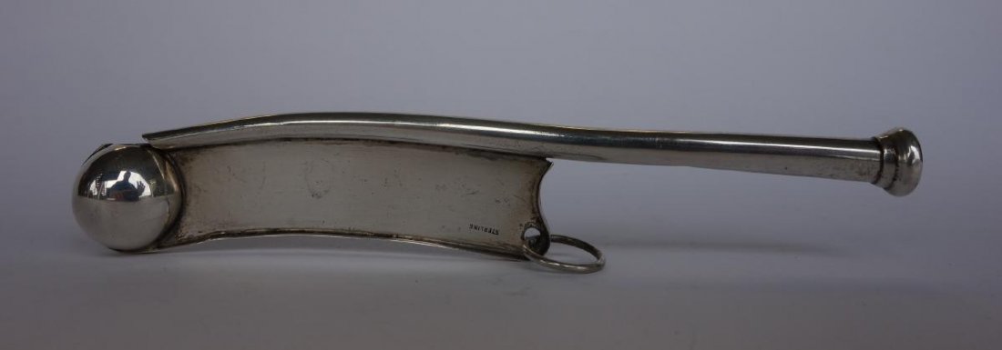 Sterling Bosun's Whistle, Boatswain's Call: A sterling bosun's whistle also known as a boatswain's call. Marked sterling. Measures 5-3/8" long. Weighs 25.1 grams.