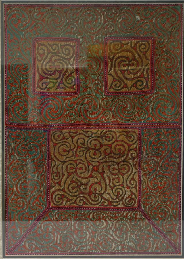 Framed Middle Eastern Needlework Tapestry: Framed Middle Eastern needlework tapestry. Multi colored threads depicting a stylized scroll motif. Measures 18.75" x 13.25". Framed measurement 27" x 21.75".