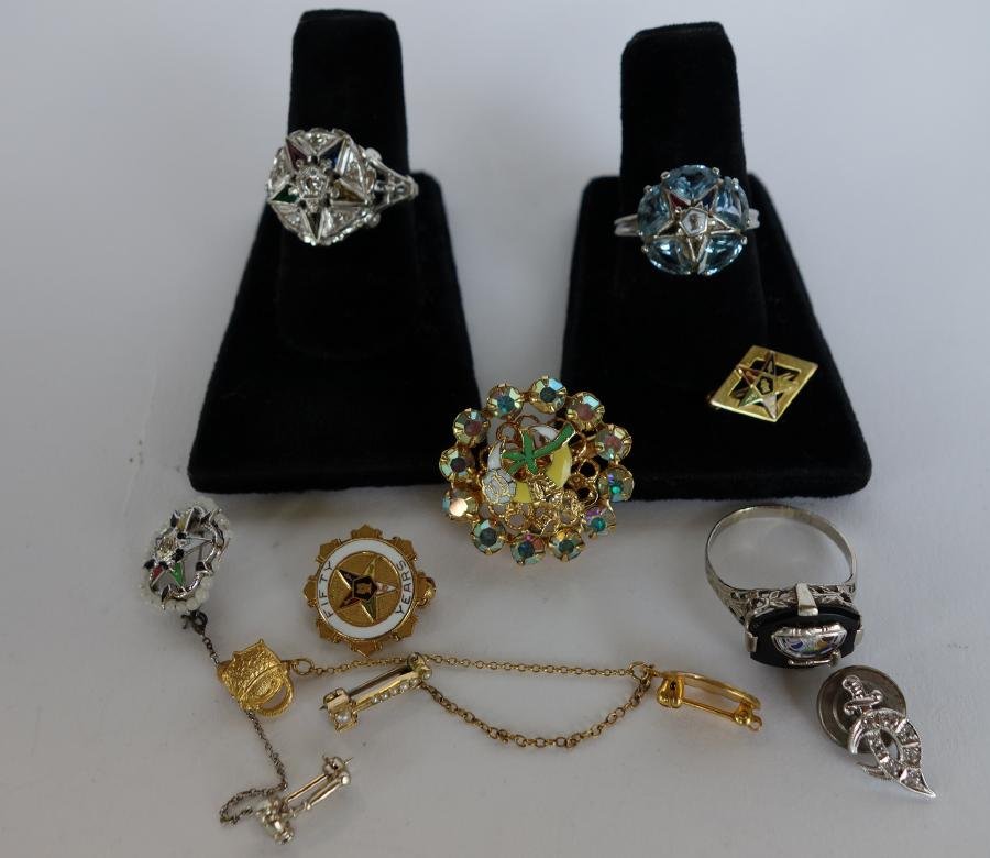 Masonic Jewelry, Rings & Pins, 14K & 10K Gold: Masonic jewelry. Comprised of 3 rings and 6 pins. One ring set with diamonds and semi-precious stones in 14K gold, a second ring set in 10K with five faceted aqua marines, the third ring in 10K gold a