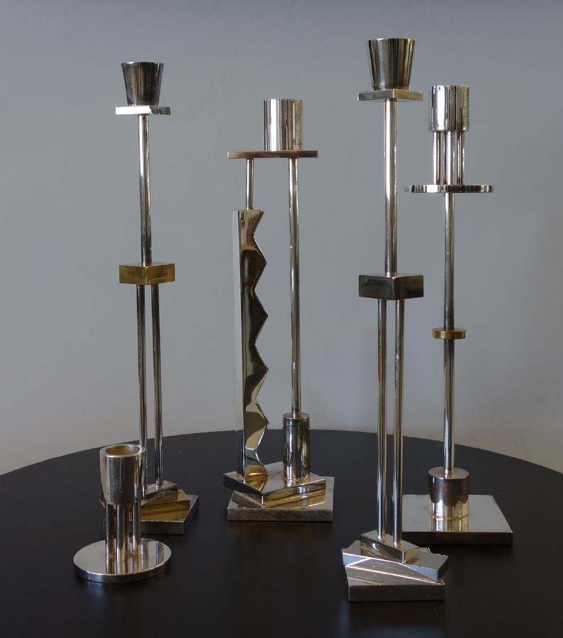 5 Swid Powell Ettore Sottsass Candlesticks: A group of five candlesticks / candleholders by Swid Powell, designed by Ettore Sottsass. Fine silverplated candlesticks (two with some brass detailing), Made in Italy. The tallest measuring 13.75" hi