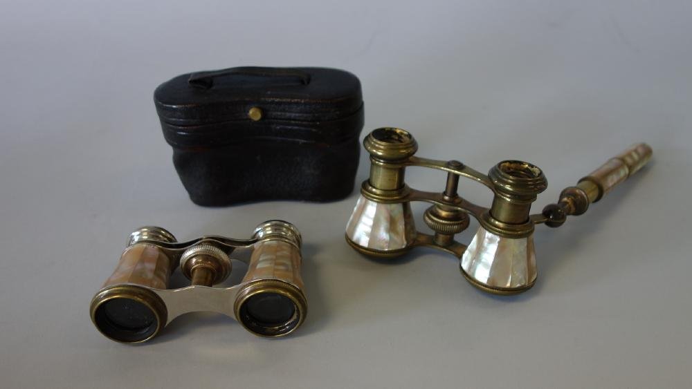 Opera Glasses, 2 Pair, Mother of Pearl: Two pair of opera glasses. Each with mother of pearl inlay. One with handle. The other pair marked Lamier, Paris and with case.