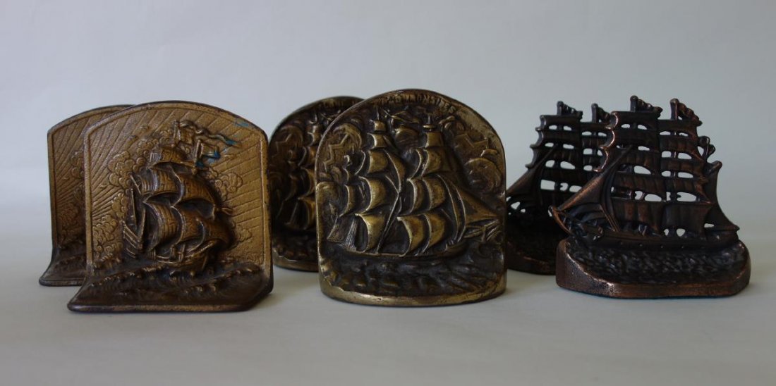 3 Sets of Cast Iron Ship Bookends: Three sets of cast iron ship bookends, each depicting masted sailing clipper ships and measuring approximately 5" high. One of the pair by The Connecticut Foundry, c.1928 depicts the Yankee Clipper.