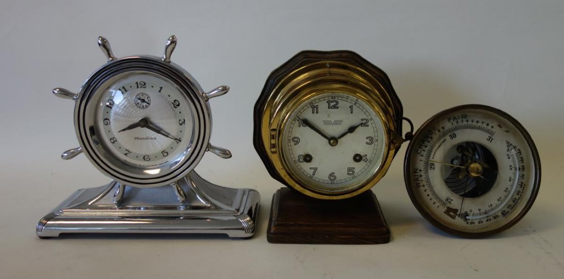 Maritime & Ship's Brass Clocks & Barometer: A Maritime mantel clock by the Lux Clock Mfg Co. Together with a brass ship's clock, Made in Germany. Maker's mark SVS and a brass wall barometer.
