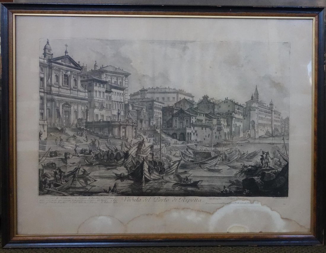 Piranesi, Veduta del Porto di Ripetta, Engraving: Framed engraving by Giovanni Battista Piranesi (1720-1778). Titled "Veduta del Porto di Ripetta". Measures 20.5" x 27.5". Framed measurement 22.75" x 30". NOTE: some water damage at the margins.