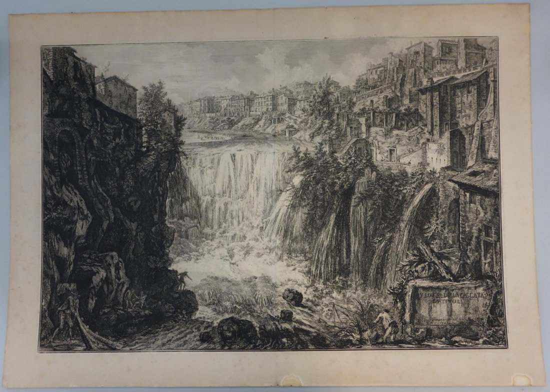 Piranesi, Veduta Della Cascata Di Tivoli, 1766: Framed engraving by Giovanni Battista Piranesi (1720-1778). Titled "Veduta Della Cascata Di Tivoli". Measures 22.25" x 31.25". Framed measurement 24.5" x 33.75". NOTE: some water damage at the margins