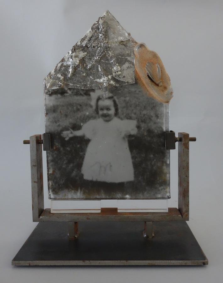 Theresa Batty, Cast Glass Photo Emulsion: A photo emulsion in cast glass by Seattle / Denmark glass artist Theresa Batty. The archival black and white photograph / photo-album snapshot, is embedded like fossils in shaped blocks of cast glass.