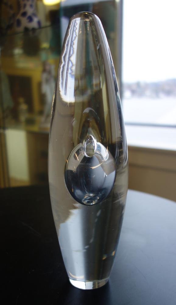 Orrefors Freeform Art Glass Sculpture: A Mid-Century Swedish freeform art glass sculpture. Oblong form centered by a cased glass bubble. Possibly Orrefors, Sweden. Measures 10.25" high. Indistinctly signed underfoot and with numerals 7568.